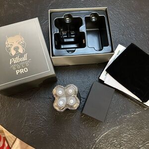 Pitbull Skull Shaver Gold Pro - Black and silver. New in box. Never used.